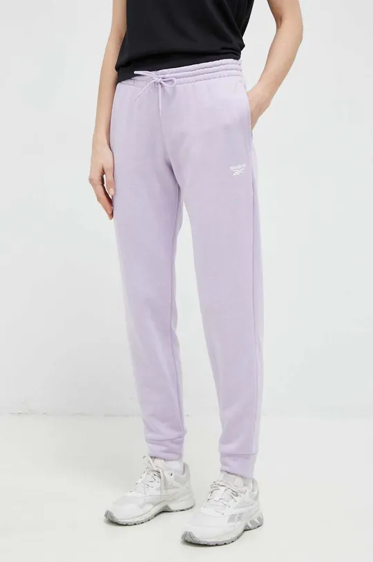 фіолетовий Спортивні штани Reebok Жіночий