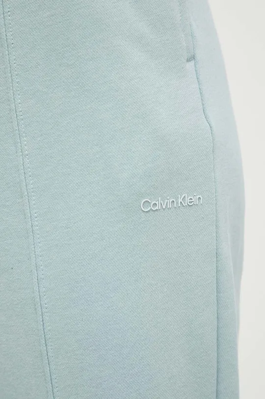 modrá Tréningové nohavice Calvin Klein Performance Essentials