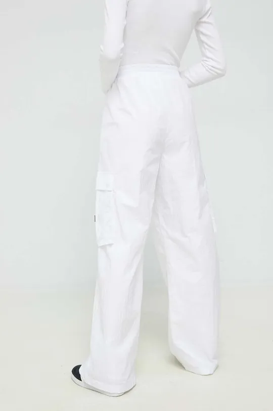 Παντελόνι Tommy Jeans  Κύριο υλικό: 100% Πολυαμίδη Φόδρα: 100% Πολυεστέρας
