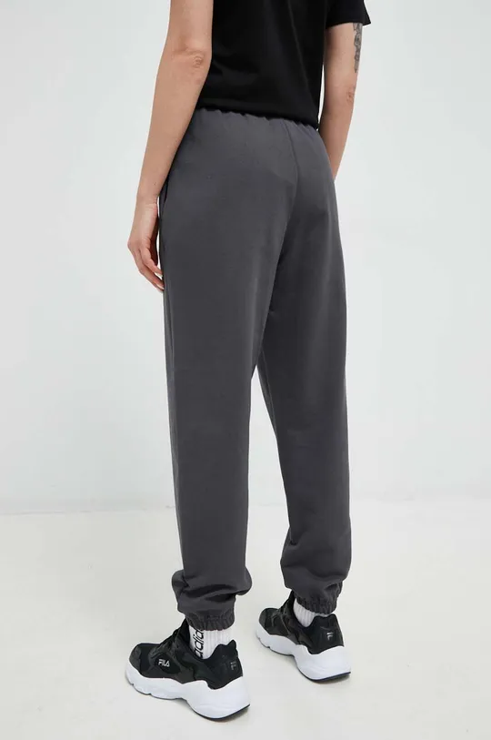 New Balance spodnie dresowe bawełniane 100 % Bawełna