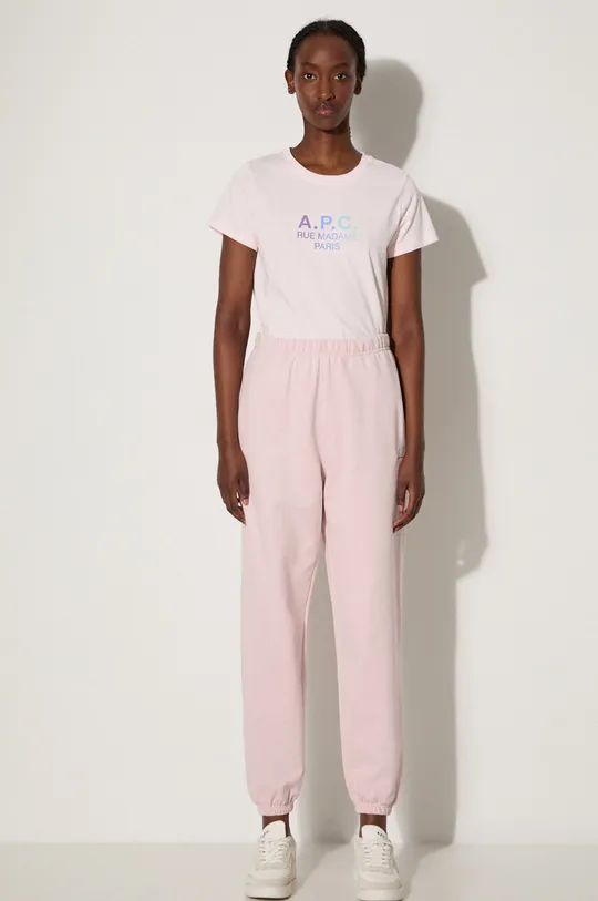 Бавовняні спортивні штани New Balance рожевий