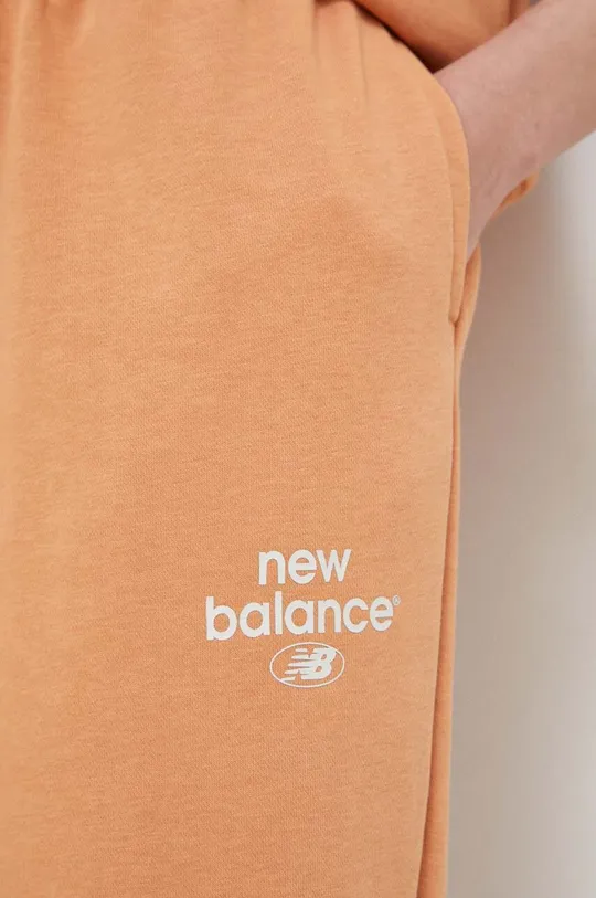 portocaliu New Balance pantaloni de trening