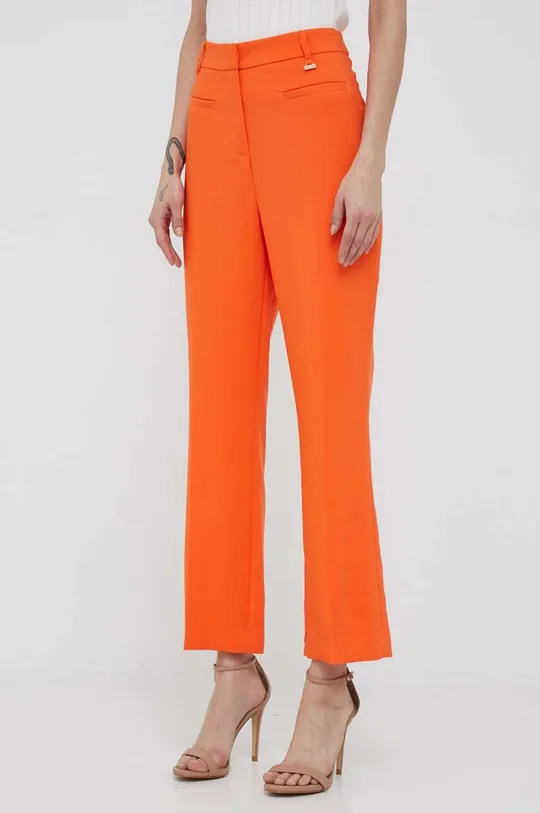 Nohavice Artigli oranžová