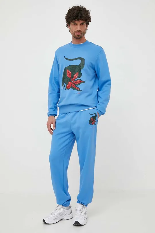 Бавовняні спортивні штани Lacoste x Netflix блакитний