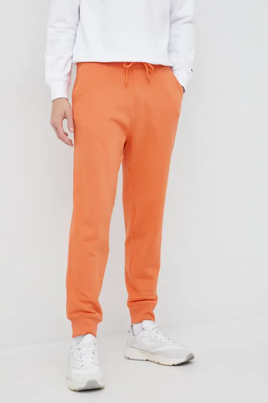pomarańczowy United Colors of Benetton spodnie dresowe bawełniane Męski