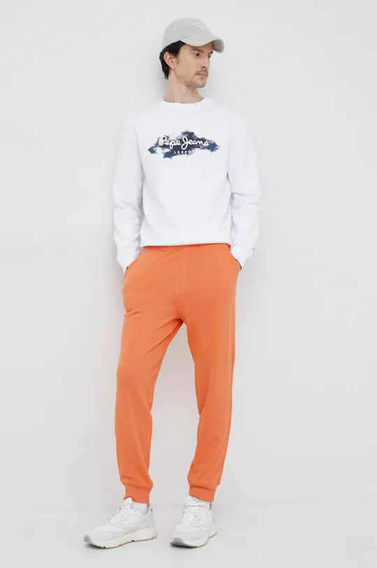 United Colors of Benetton spodnie dresowe bawełniane pomarańczowy