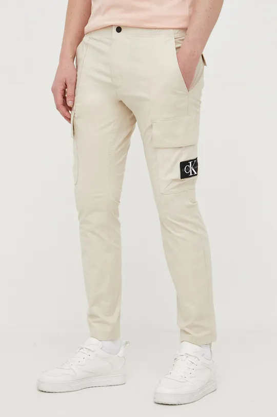 beżowy Calvin Klein Jeans spodnie Męski
