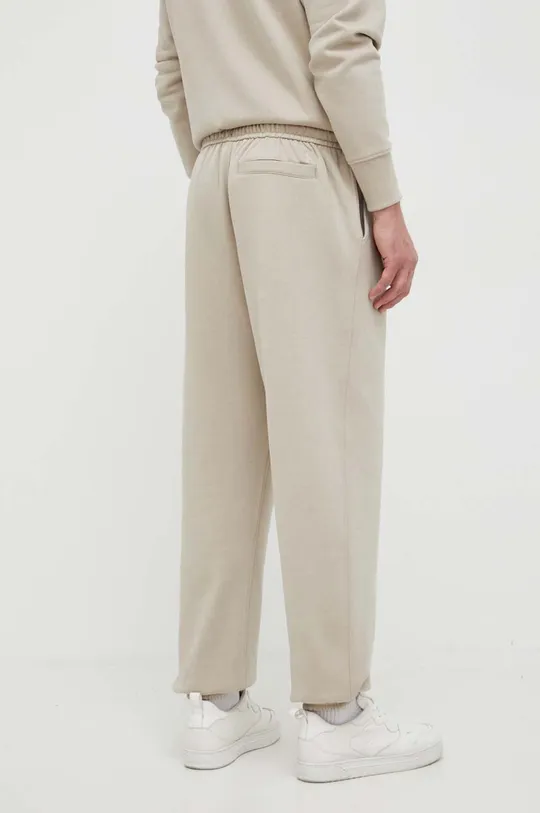 Tepláky Calvin Klein Jeans 55 % Bavlna, 45 % Polyester