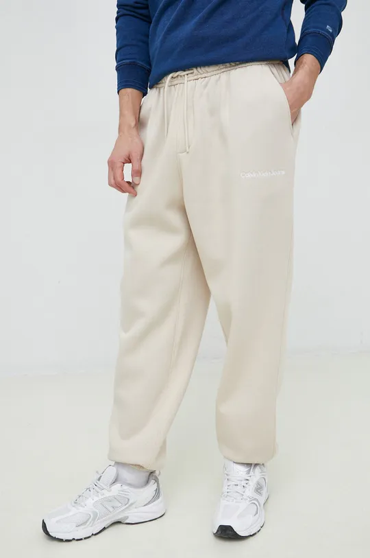Calvin Klein Jeans spodnie dresowe beżowy