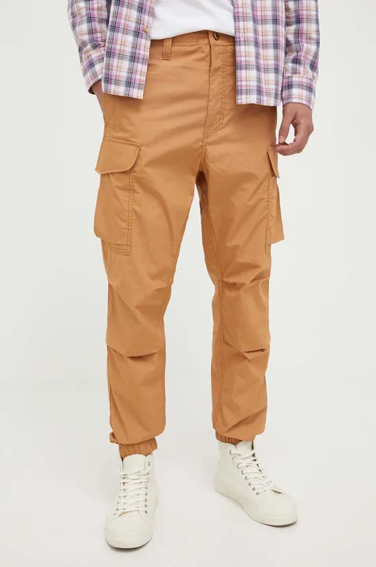 Βαμβακερό παντελόνι G-Star Raw πορτοκαλί
