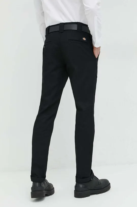 Dickies trousers  Basic material: 65% Polyester, 35% Cotton Pocket lining: 75% Polyester, 25% Cotton