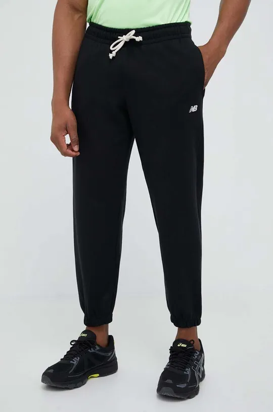 czarny New Balance spodnie dresowe Athletics Remastered Męski