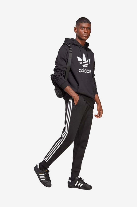 Tepláky adidas Originals černá