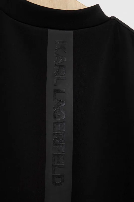Dievčenské šaty Karl Lagerfeld  1. látka: 95 % Polyester, 5 % Elastan 2. látka: 90 % Polyester, 10 % Elastan