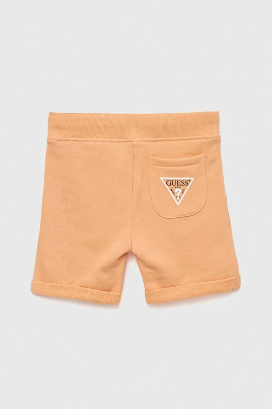 Otroške bombažne kratke hlače Guess oranžna