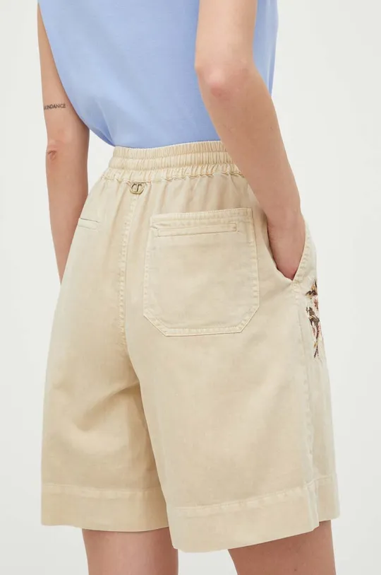 Kratke hlače s dodatkom lana Twinset  Temeljni materijal: 80% Pamuk, 20% Lan Postava džepova: 100% Pamuk Vez: 100% Poliester
