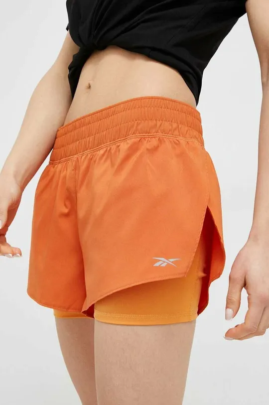 Bežecké šortky Reebok oranžová
