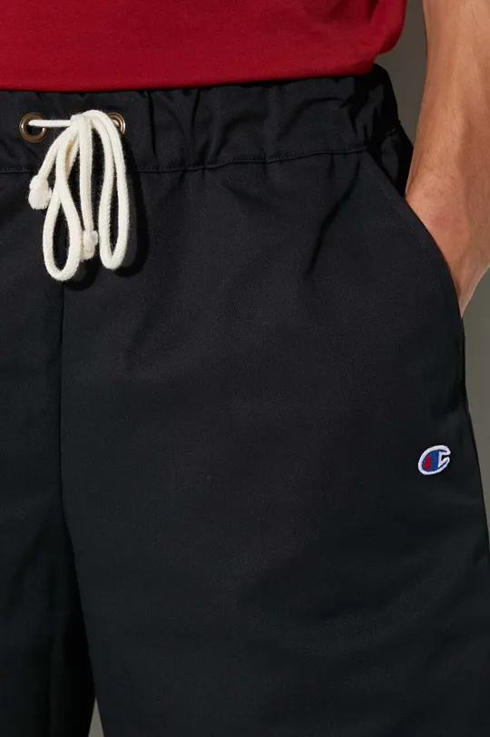 Champion pantaloni scurți  Materialul de baza: 65% Bumbac, 35% Poliester  Insertiile: 100% Bumbac
