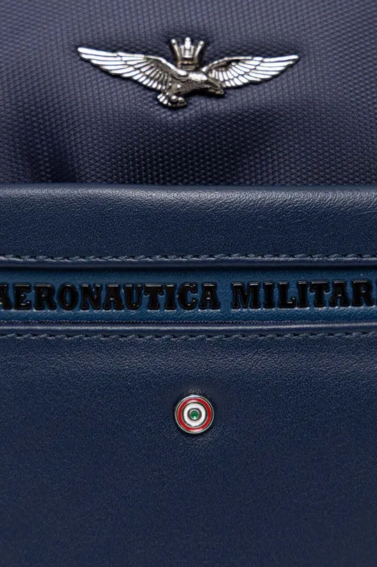 Σακκίδιο Aeronautica Militare  Κύριο υλικό: 100% PU - πολυουρεθάνη Φόδρα: 100% Πολυεστέρας
