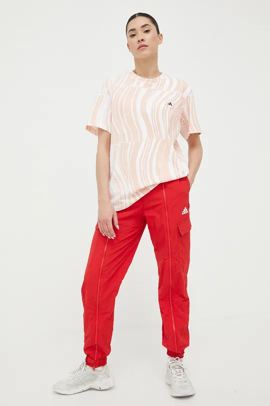 Βαμβακερό μπλουζάκι adidas by Stella McCartney πορτοκαλί