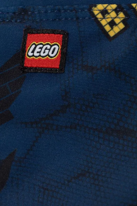 Otroške kopalke Lego x Batman Glavni material: 82 % Poliester, 18 % Elastan Podloga: 92 % Poliester, 8 % Elastan