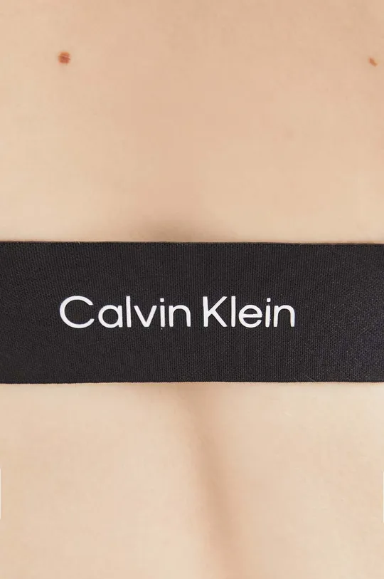 Plavková podprsenka Calvin Klein 1. látka: 78 % Polyamid, 22 % Elastan 2. látka: 92 % Polyester, 8 % Elastan 3. látka: 54 % Polyamid, 22 % Polyester, 19 % Elastan, 5 % TPU