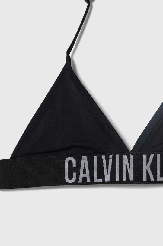 Dječji dvodijelni kupaći kostim Calvin Klein Jeans Temeljni materijal: 78% Poliamid, 22% Elastan Postava: 92% Poliester, 8% Elastan Drugi materijali: 86% Poliester, 14% Elastan