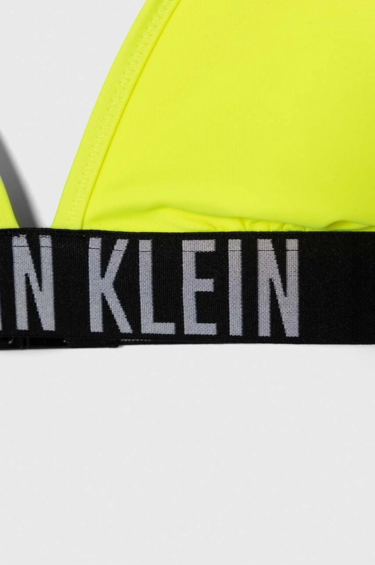 Dječji dvodijelni kupaći kostim Calvin Klein Jeans Temeljni materijal: 78% Poliester, 22% Elastan Postava: 92% Poliester, 8% Elastan Traka: 86% Poliester, 14% Elastan