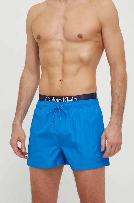 Plavkové šortky Calvin Klein modrá