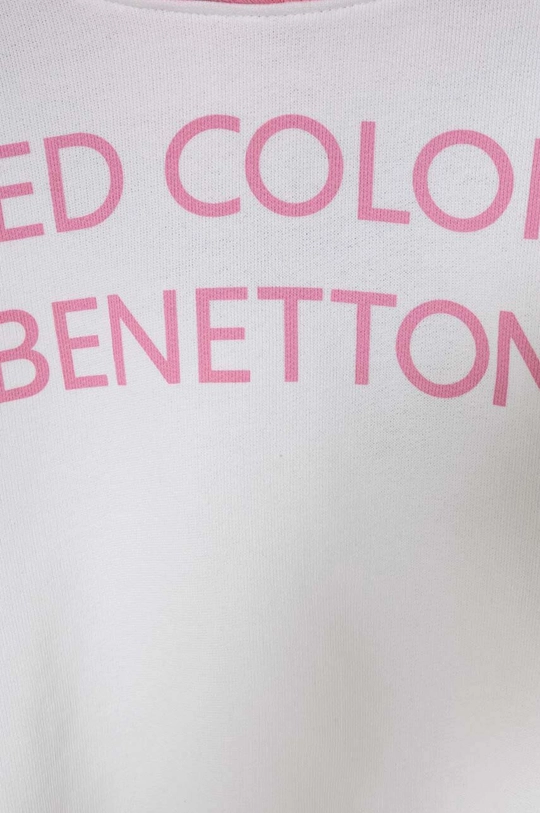 Παιδική βαμβακερή μπλούζα United Colors of Benetton Κύριο υλικό: 100% Βαμβάκι Πρόσθετο υλικό: 96% Βαμβάκι, 4% Σπαντέξ