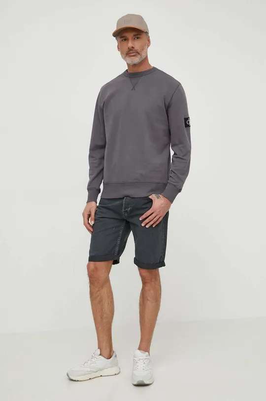 Bombažen pulover Calvin Klein Jeans siva