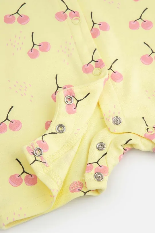 żółty Coccodrillo rampers bawełniany niemowlęcy