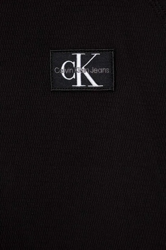 Otroška bombažna majica z dolgimi rokavi Calvin Klein Jeans črna