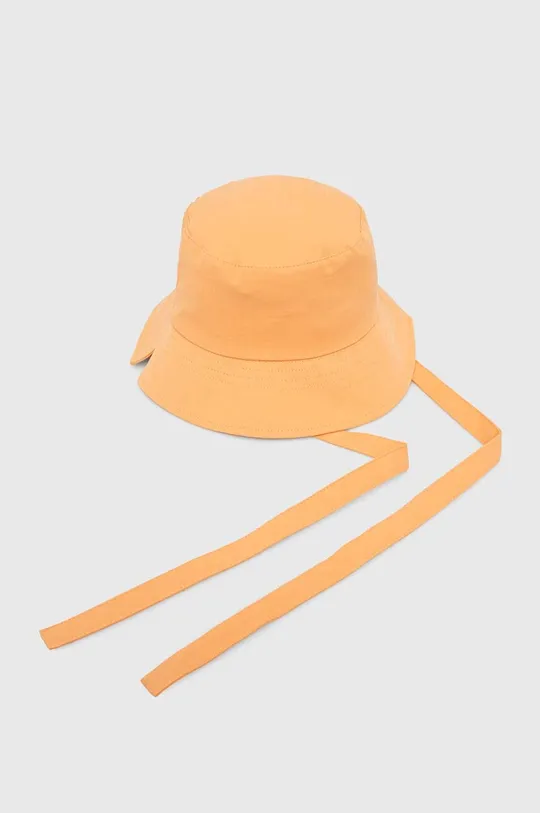 Detský bavlnený klobúk United Colors of Benetton oranžová