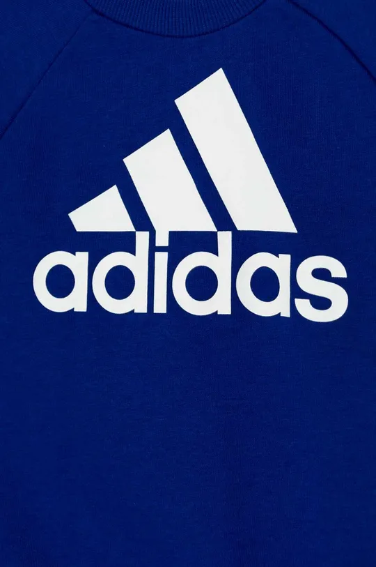 Dječja trenirka adidas Temeljni materijal: 70% Pamuk, 30% Reciklirani poliester Manžeta: 95% Pamuk, 5% Elastan