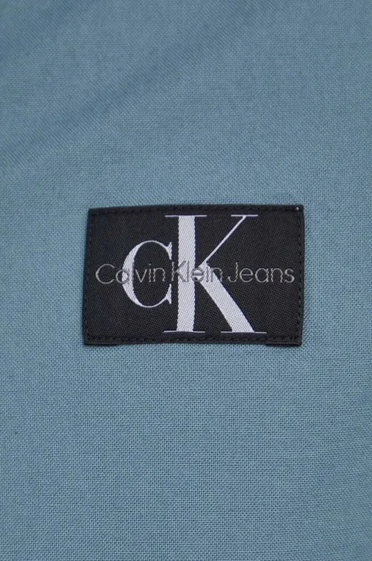 Bombažna srajca Calvin Klein Jeans turkizna