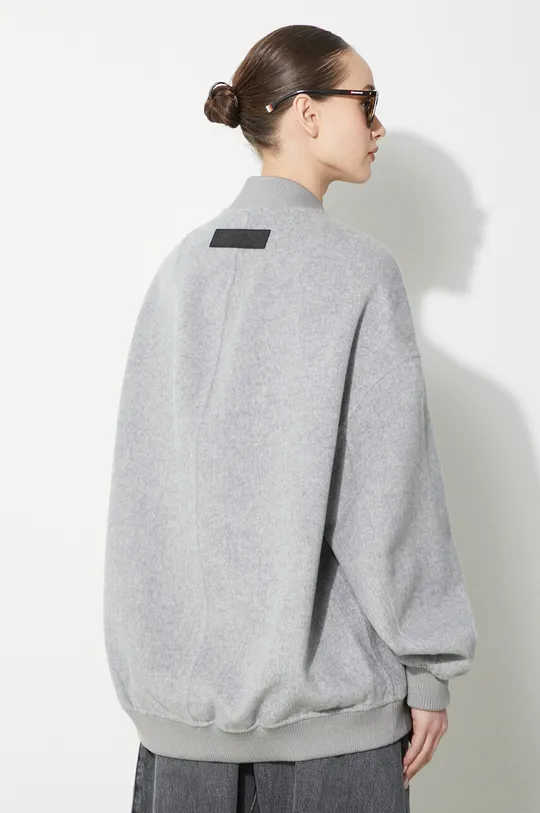 Vlnená bunda bomber JW Anderson Puller Oversized Bomber Jacket Základná látka: 100 % Vlna Podšívka vrecka: 52 % Polyester, 48 % Viskóza Elastická manžeta: 61 % Akryl, 24 % Vlna, 14 % Polyester, 1 % Elastan