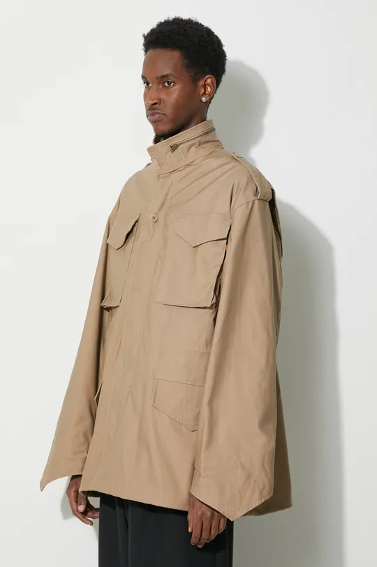 beige Alpha Industries jacket M-65