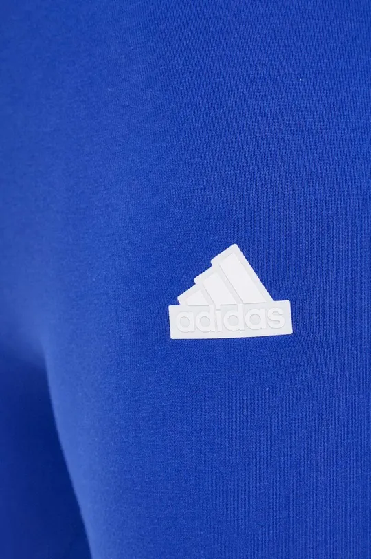 блакитний Легінси adidas