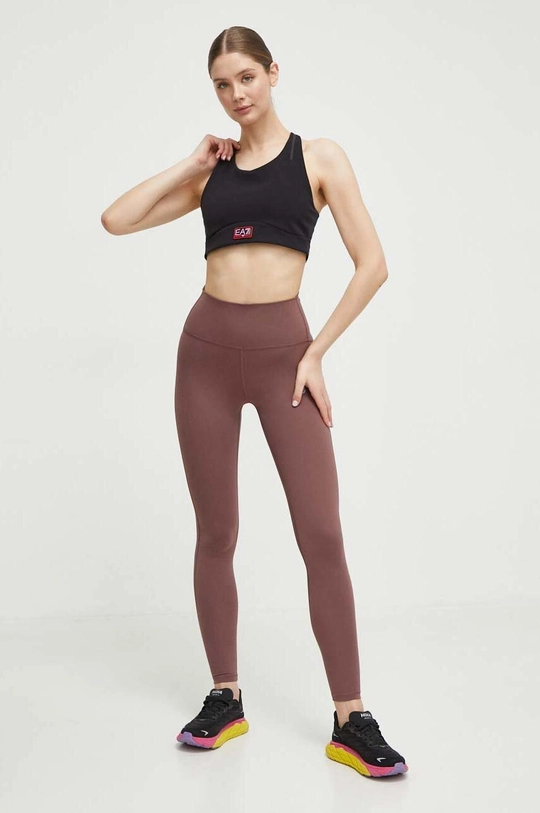 brązowy New Balance legginsy treningowe Sleek WP41237LIE Damski