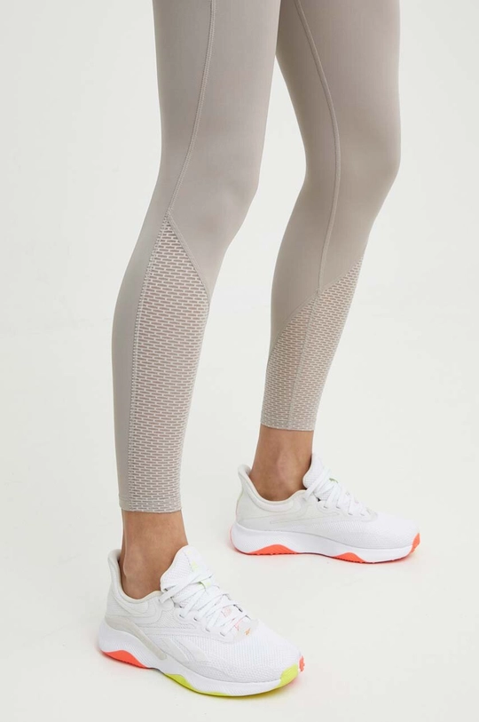 bézs Reebok legging futáshoz