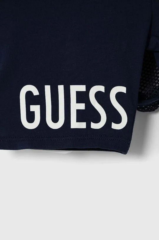 Dievčenská sukňa Guess Základná látka: 100 % Polyester Doplnkový materiál: 95 % Bavlna, 5 % Elastan