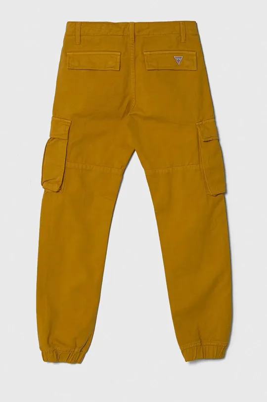 Guess jeansy dziecięce żółty