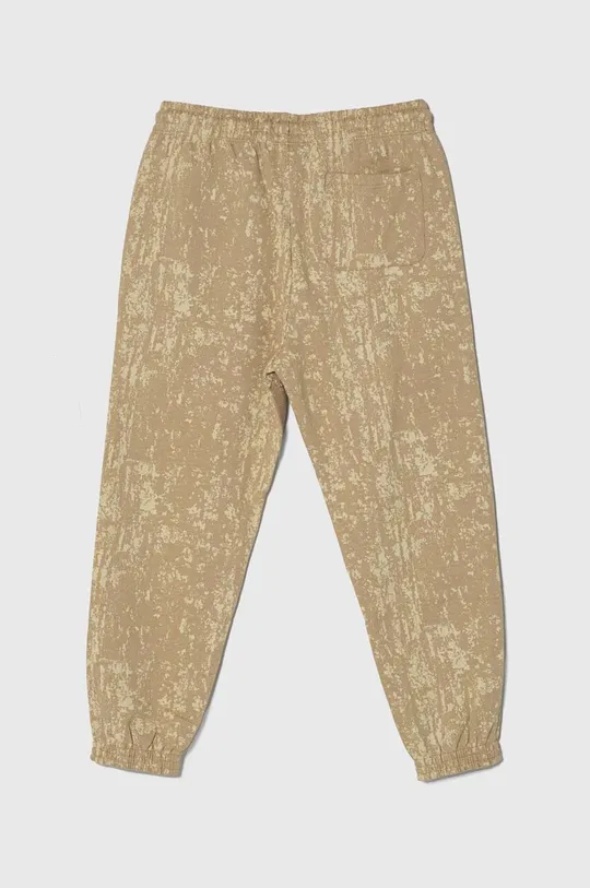 Calvin Klein Jeans spodnie dresowe bawełniane dziecięce beżowy