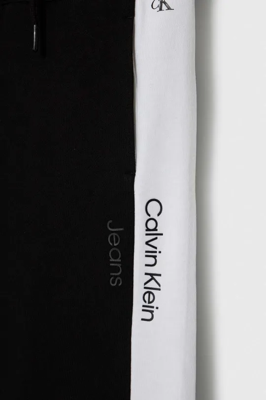 Dječji pamučni donji dio trenirke Calvin Klein Jeans Temeljni materijal: 100% Pamuk Manžeta: 95% Pamuk, 5% Elastan