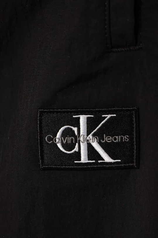 Otroški spodnji del trenirke Calvin Klein Jeans 65 % Bombaž, 35 % Poliester