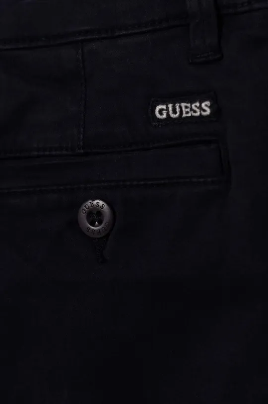 Дитячі штани Guess Основний матеріал: 97% Бавовна, 3% Еластан Підкладка: 100% Бавовна