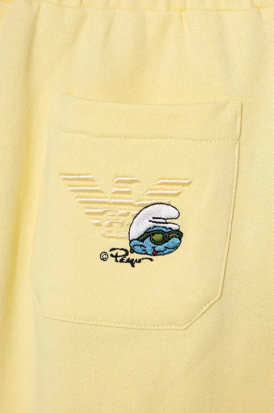 Emporio Armani spodnie dresowe bawełniane dziecięce x The Smurfs Materiał zasadniczy: 100 % Bawełna, Ściągacz: 98 % Bawełna, 2 % Elastan