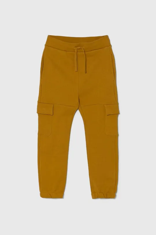 żółty United Colors of Benetton spodnie dresowe bawełniane dziecięce Chłopięcy