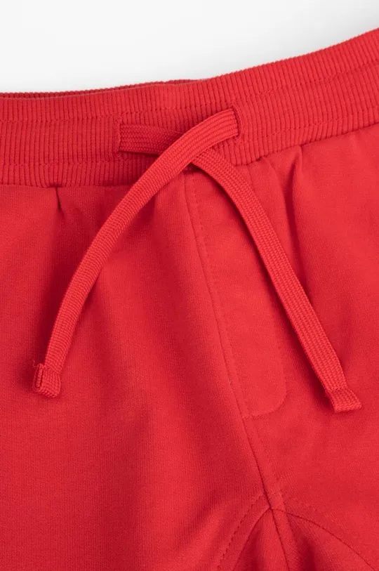 czerwony Coccodrillo spodnie dresowe bawełniane dziecięce